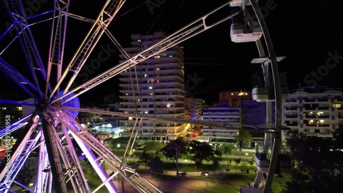 Giant Wheel in the City at Night photo