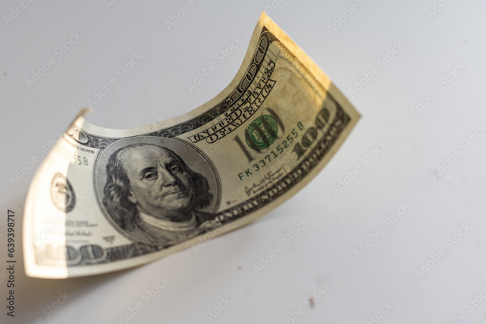 flying hundred dollar banknote isolated on white flying hundred dollar banknote isolated on white
