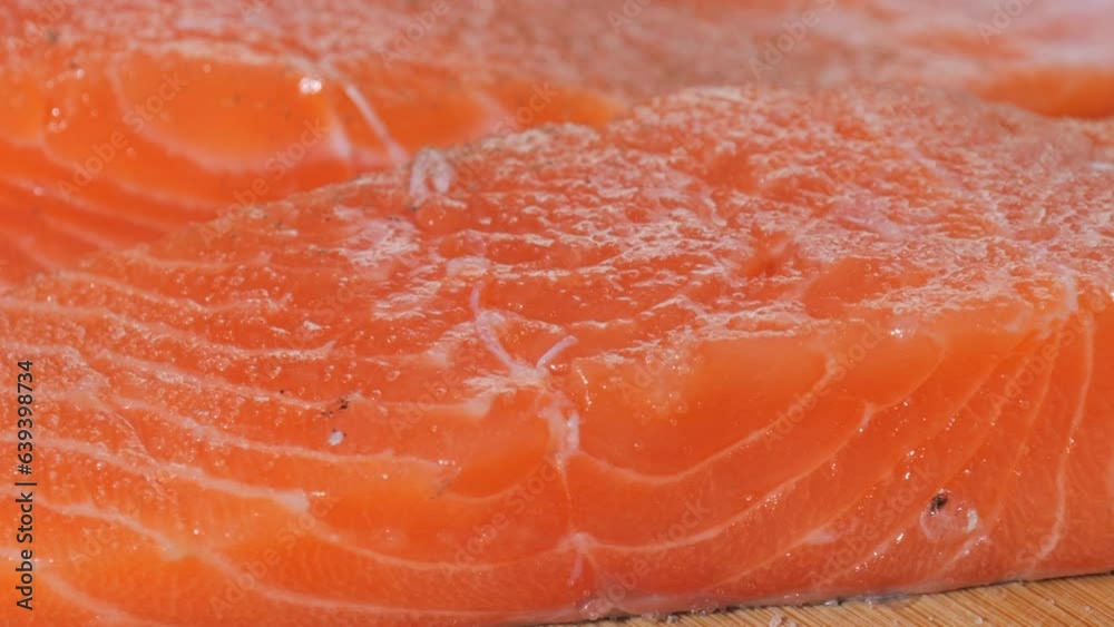 Fresh raw red salmon fish fillet meat close up view Fresh raw red salmon fish fillet meat close up view