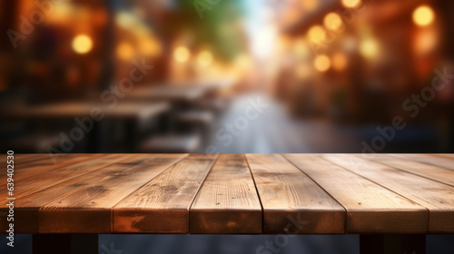 A wooden table with a blurred background