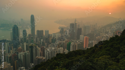 Hong Kong city view from The Peak, sunrise with foggy mist over the city of Hong Kong