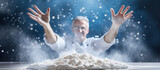 Baker with clouds of flour, making a mess with flour, sprinkles of flour movement, blue background