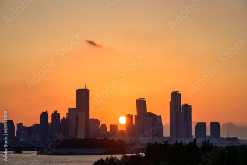 The night view of the city of Yeouido, a high-rise building, shot at Dongjak Bridge in Seoul at sunset