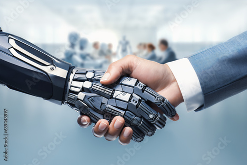 Closeup of handshake between human businessman vs AI humanoid robot - Futuristic shaking hands in the modern meeting room between human people and cyborg robots - Artificial intelligence concept.