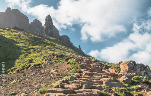 The view of the footpath and steps leading to the Old Man of Storr in the Isle of Skye and the surrounding scenery in sunny days