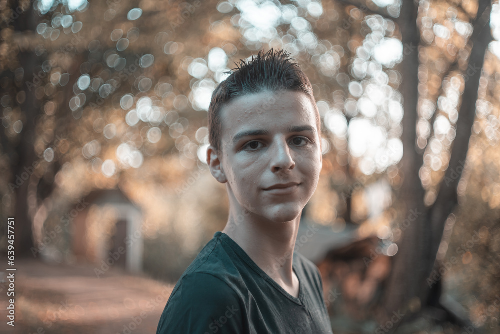 portrait of a handsome boy outside in natural light portrait of a handsome boy outside in natural light