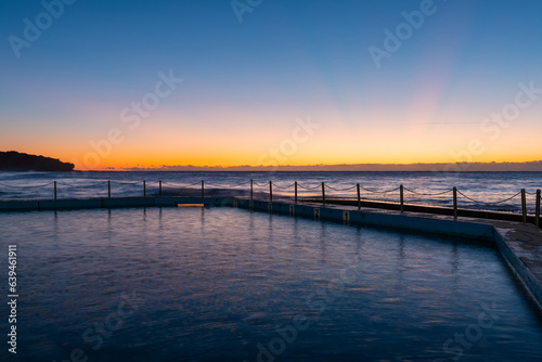 Fototapeta Naklejka Na Ścianę i Meble -  Beautiful sunrise view of Curl Curl rock pool, Sydney, Australia.