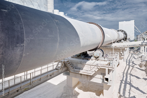 Photos Roasting rotary furnace with pipe at manufacturing plant