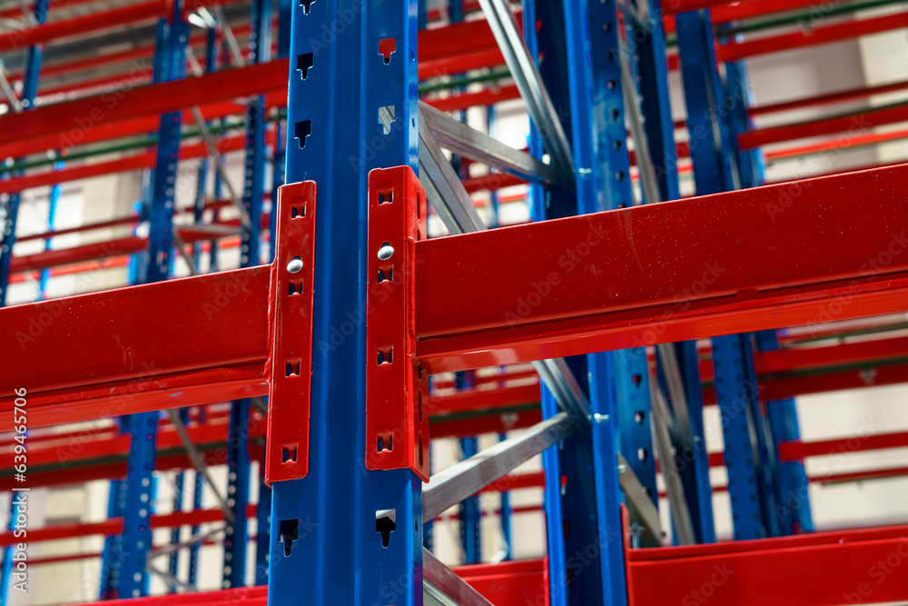 Commercial huge empty distribution warehouse with high racking Commercial huge empty distribution warehouse with high racking