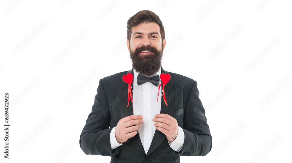 Love time. special occasion party. male groom on wedding ceremony. going to make proposal. bearded man red hearts. love symbol. happy valentines day. love is blind. tuxedo man on formal event Love time. special occasion party. male groom on wedding ceremony. going to make proposal. bearded man red hearts. love symbol. happy valentines day. love is blind. tuxedo man on formal event