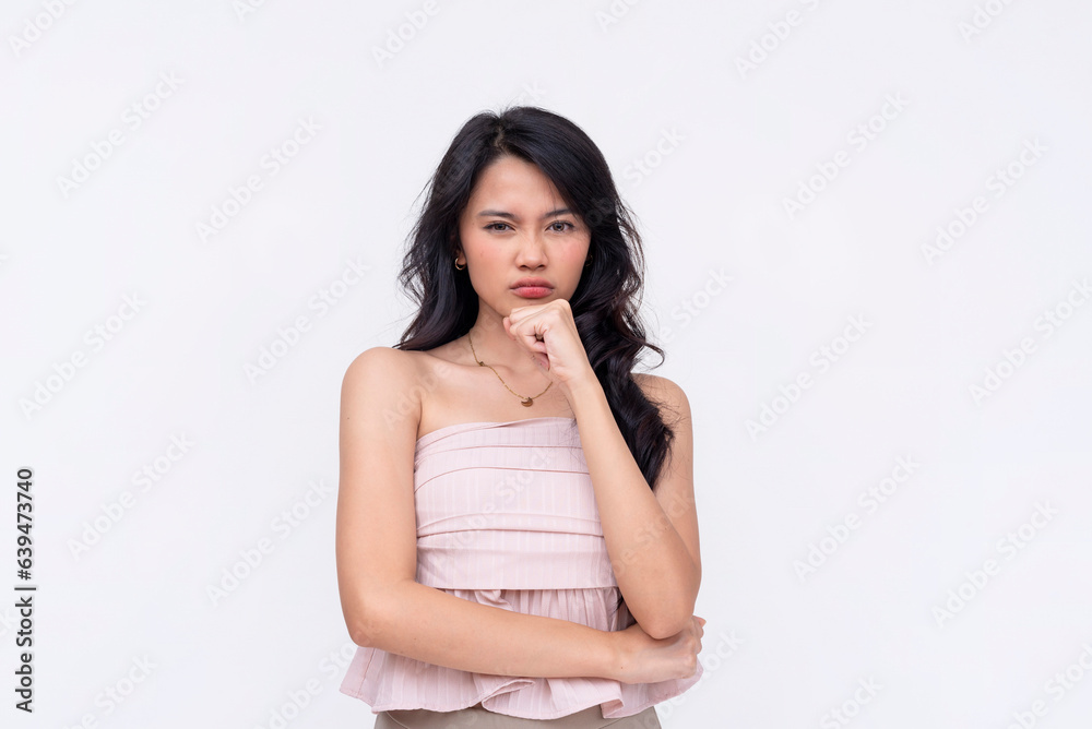A pretty lady looking at someone feeling suspicious or doubt about their true motive. Isolated on a white background. A pretty lady looking at someone feeling suspicious or doubt about their true motive. Isolated on a white background.