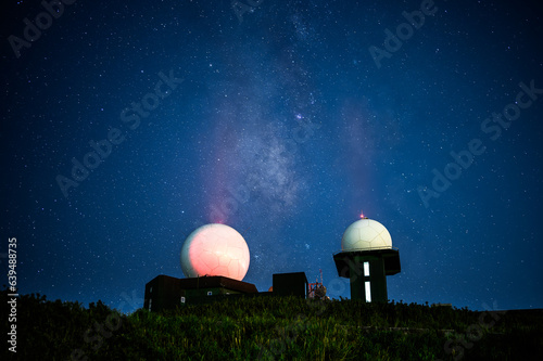 Milky Way: Watch the night view of the starry sky. The radome glows red. The Wufenshan Weather Radar Station stands on the top of the mountain. Taiwan