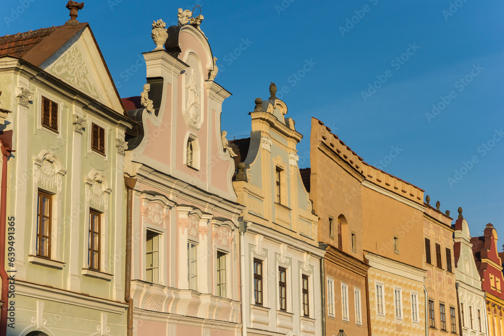 Facades in the warm evening light at the market square of Telc, Czech Republic