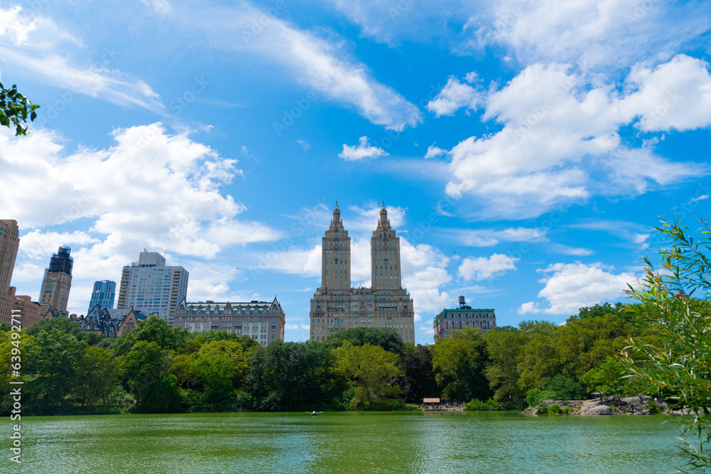 central park of new york. Beautiful view of the Jacqueline Kennedy Onassis Reservoir in urban park. city landscape of manhattan ny from central park. nyc and manhattan. Famous for its landmarks central park of new york. Beautiful view of the Jacqueline Kennedy Onassis Reservoir in urban park. city landscape of manhattan ny from central park. nyc and manhattan. Famous for its landmarks