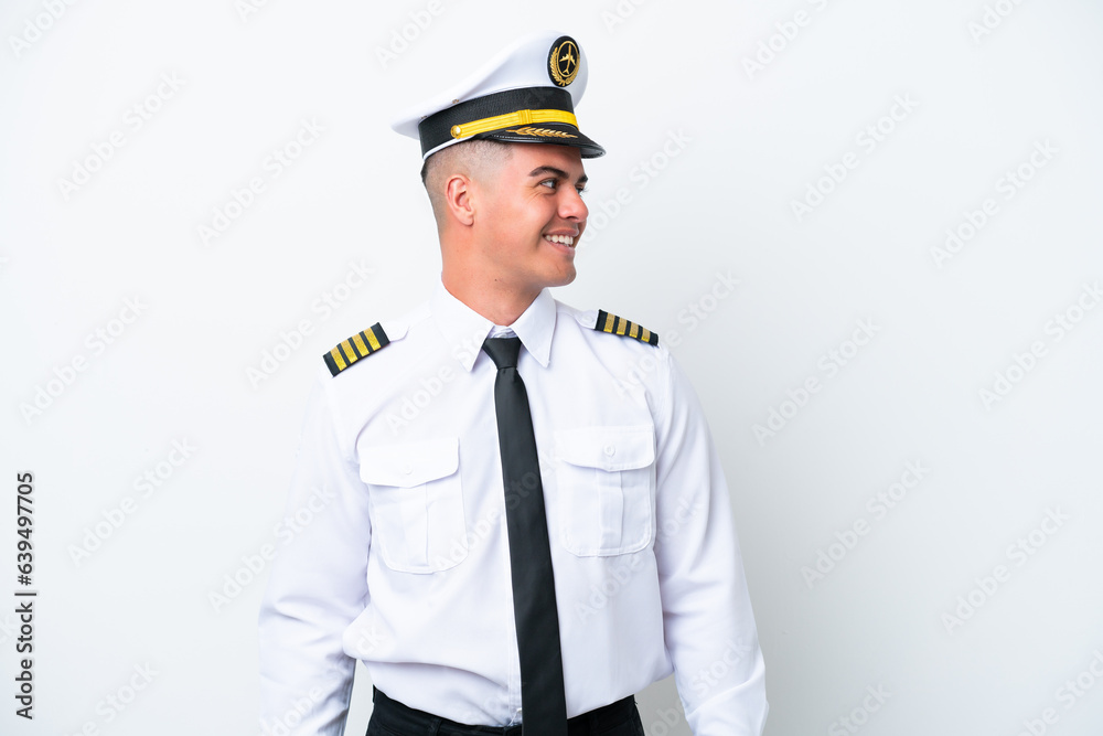 Airplane pilot caucasian man isolated on white background looking side