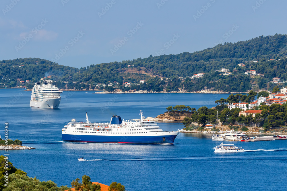 Cruise ship, ferry and boats in the Mediterranean Sea Aegean island of Skiathos, Greece