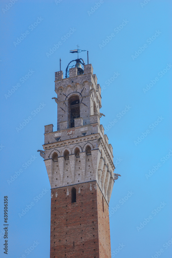 Top of the town hall at the Palazzo Publicco in Siena. Tuscany, Italy,
