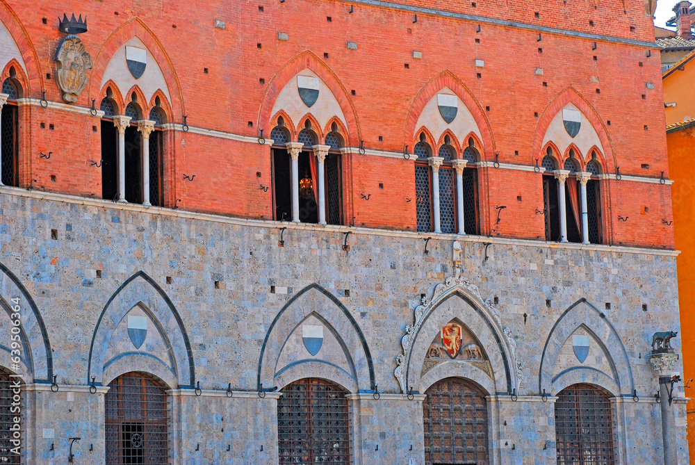 Fototapeta premium The facade of the Palazzo Pubblico (town hall) is a palace in Siena. Construction was started in 1297. Tuscany, Italy