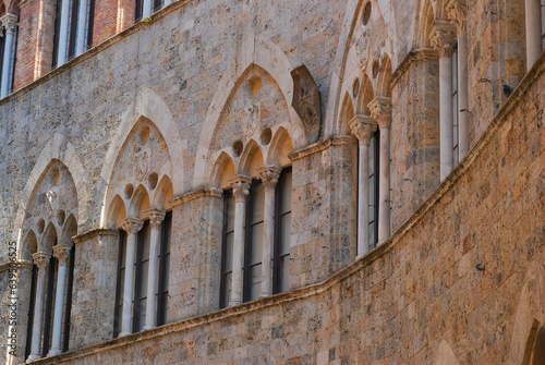 Siena - the facade of the Palazzo Chigi-Saracini. Tuscany Italy photo