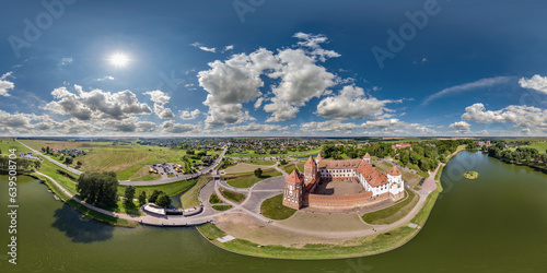 aerial seamless spherical hdri 360 panorama overlooking restoration of the historic castle or palace near lake in equirectangular projection with red shingles roof