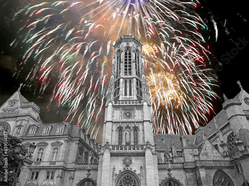 Celebratory fireworks over the Great gothic church of Saint Germain l Auxerrois, Paris, France