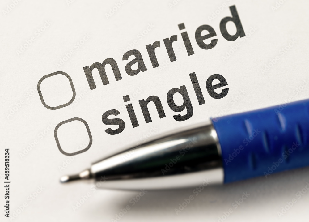 Married or single. blank checkbox with on white paper with pen. Family
