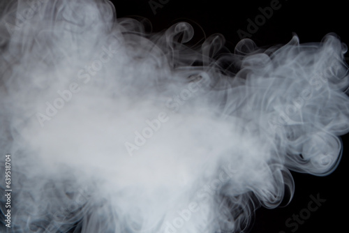 Beautiful white smoke with natural pattern on black background with charming pattern