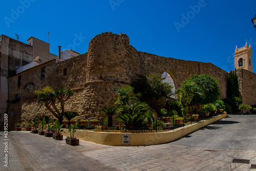 nnarrow streets of the old town in Calpe Spain on a summer hot holiday day photo