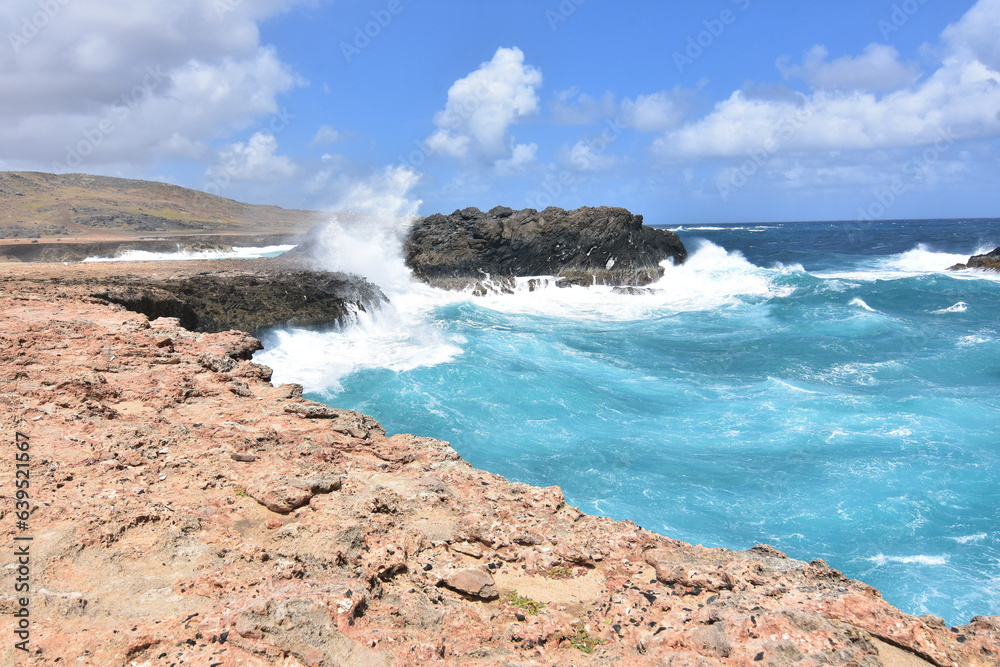 Sea Cliffs with Water Running Down them In Aruba
