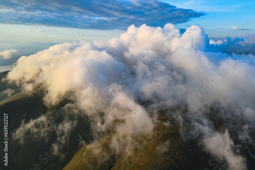 Scenic clouds on the mountain ridge © Mny-Jhee
