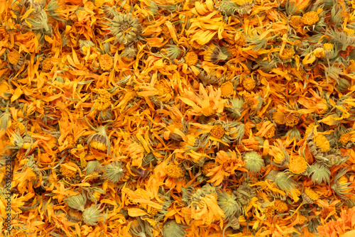 Dried marigold texture, flat lay
