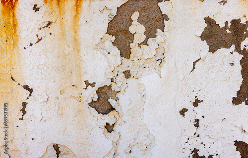 Texture of an old wall with peeling paint