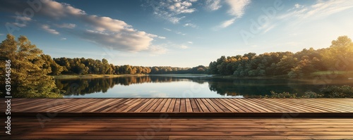 Lakeside wooden deck with a clear sky.