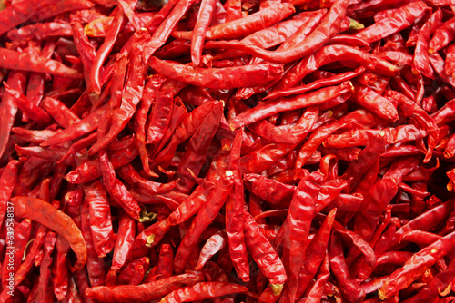 Seamless red chillies background 