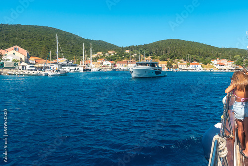 Boats in the fishing port of Fiskardo village on Kefalonia island, Greece © unai