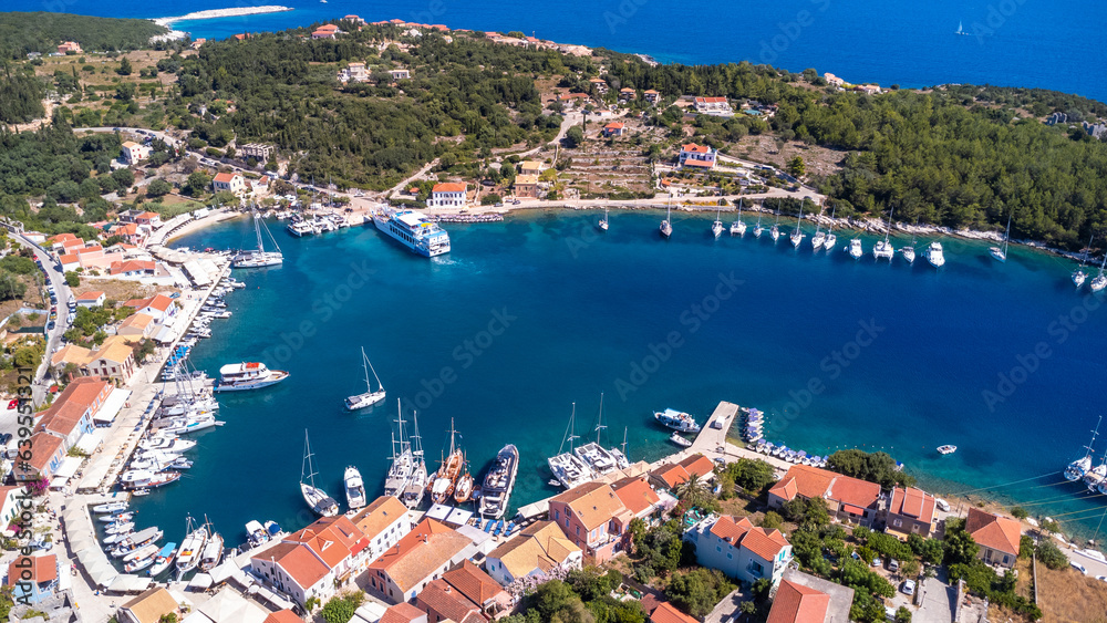 Aerial drone panorama of Fiskardo village port on Kefalonia island, Greece