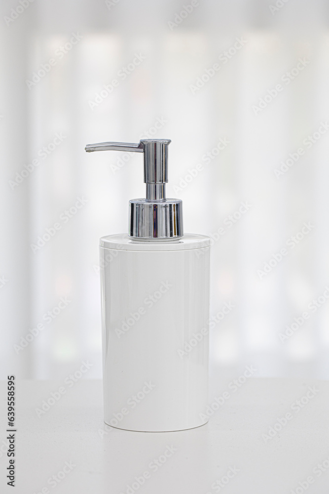 White unbranded dispenser bottle isolated on white background. White unbranded dispenser bottle isolated on white background.