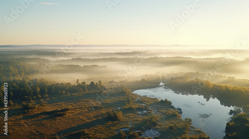 aerial shot of a vibrant, lush wildlife reserve at sunrise, filled with diverse species of animals, hazy morning light drenching the landscape, captured with a drone