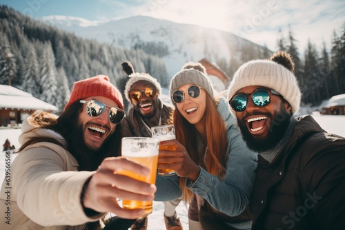 a group of young cheerful diverse men and women posing for a photo on the ski vacation in the mountains, drinking alcoholic beverages, wearing winter clothes, having much fun, celebrating