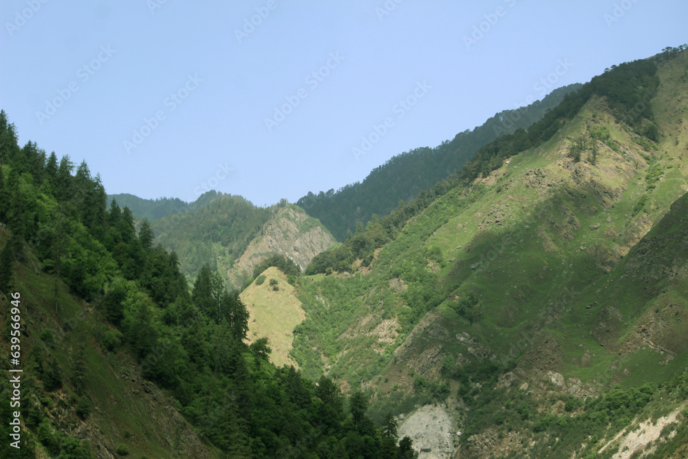 Fototapeta premium Beautiful mountain landscape of himalaya, India High Altitude mountain pass, snow mountains in the background, selective focus with blur 