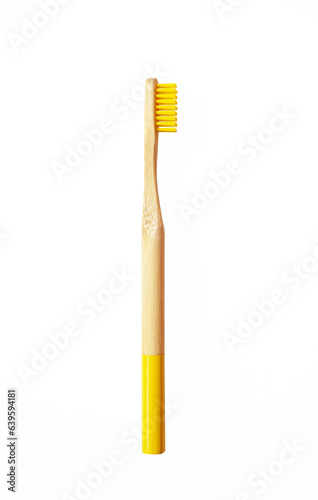 Yellow wooden bamboo toothbrush isolated on white background. Natural organic dental tooth care protection. Mock up  template