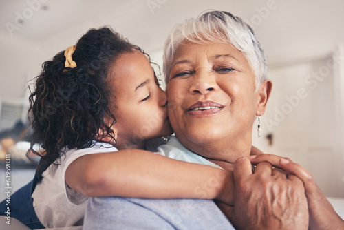 Hug, kiss or child with grandma in living room of family house with trust, care or love in retirement. Senior granny, face or happy grandmother bonding with kid to relax with smile, joy or freedom