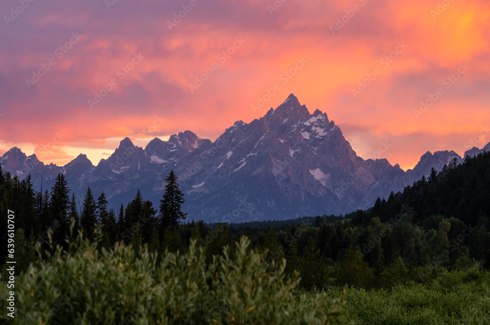 Grand Teton Stands Proud Over The Lower Areas Of The Park At Sunset