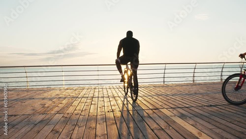 Friends bicyclists riding bikes in the morning. Cycling sports healthy lifestyle