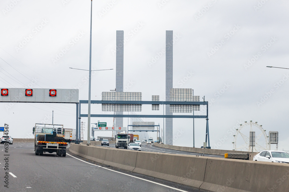 Grey cloudy day with traffic crossing Bolte Bridge over the Yarra River Grey cloudy day with traffic crossing Bolte Bridge over the Yarra River