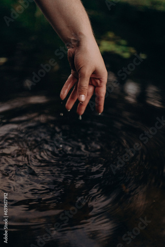 hands in water