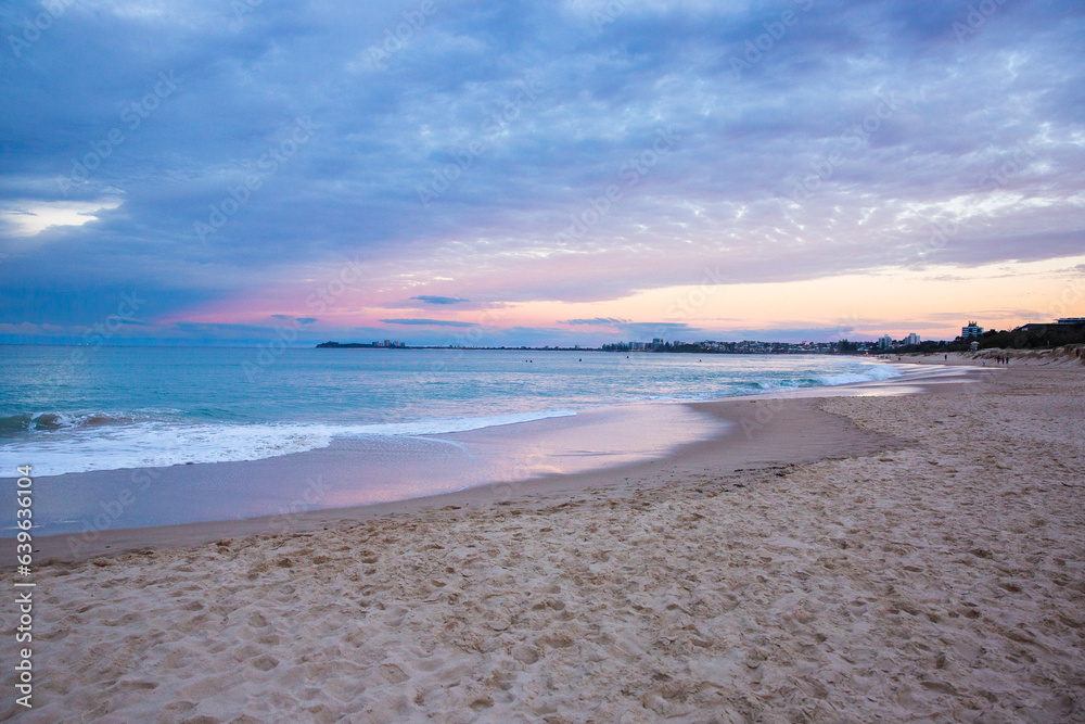 blue ocean and pink and cloudy dusk sky blue ocean and pink and cloudy dusk sky