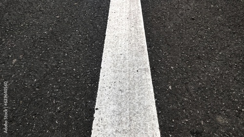 asphalt road with lines © PopCorn