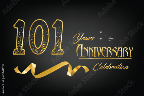 Celebrate the 101th anniversary with gold letters, gold ribbons and confetti on a dark background photo