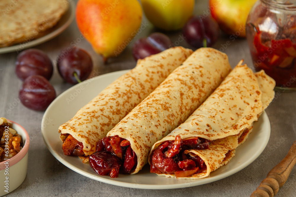 European style crepes with jam made from autumn fruits, spices and nuts
